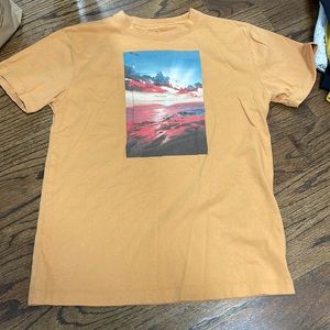yellow-orange t-shirt